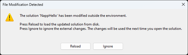 Advertencia que muestra Visual Studio, al detectar que se han añadido nuevos archivos.